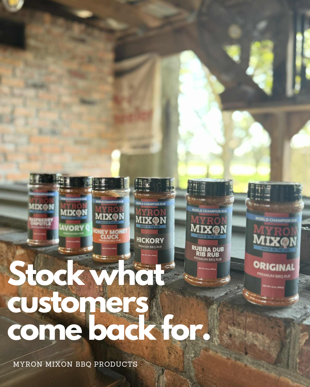 Retail shelf displaying BBQ sauces and rubs